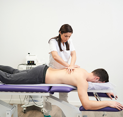Female-Chiro-adjusting-patient-posture-NF-Chiropractic Female-Chiro-adjusting-patient-posture-NF-Chiropractic